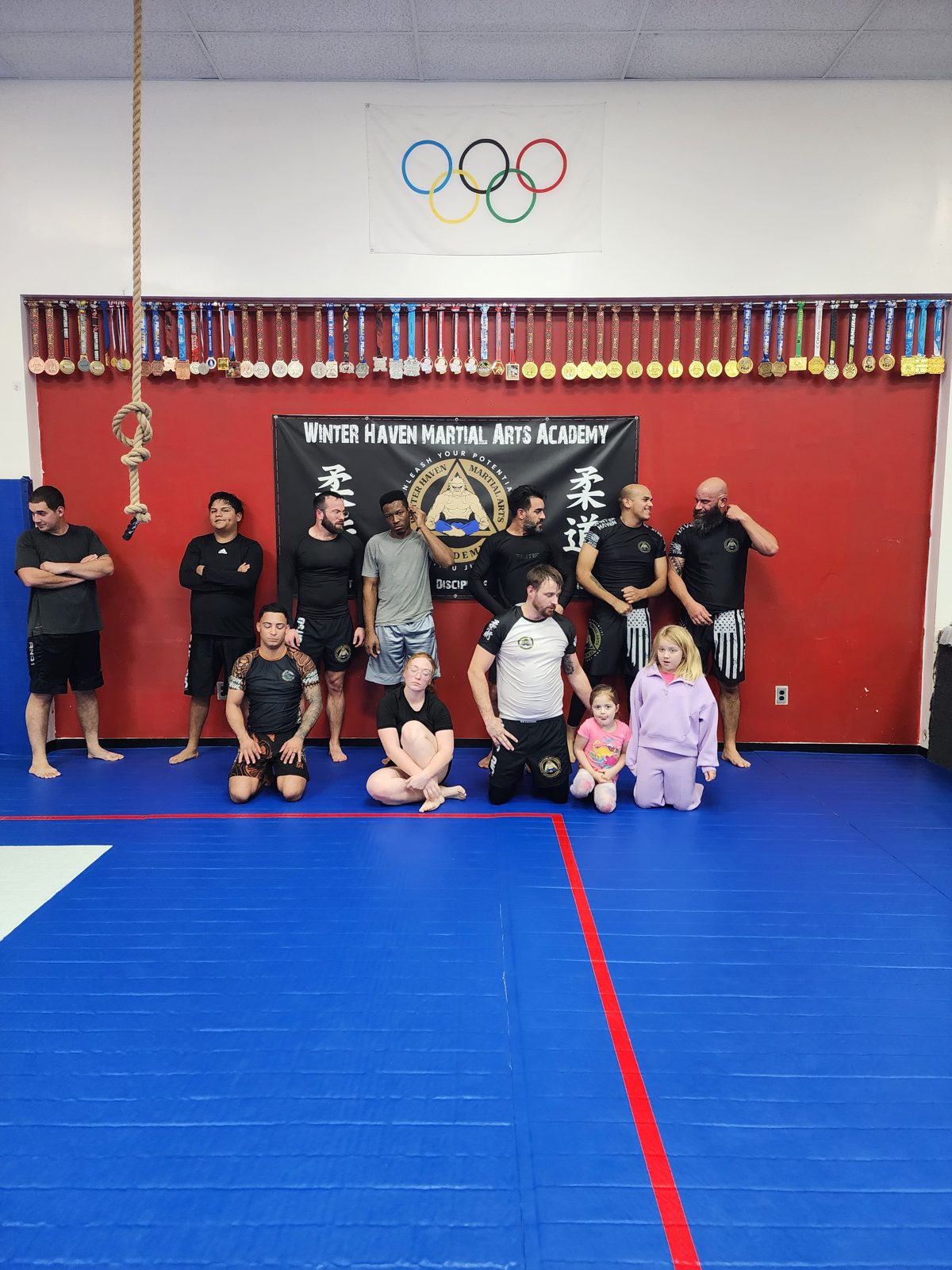 Adult Brazilian Jiu-Jitsu class group photo in Winter Haven, FL