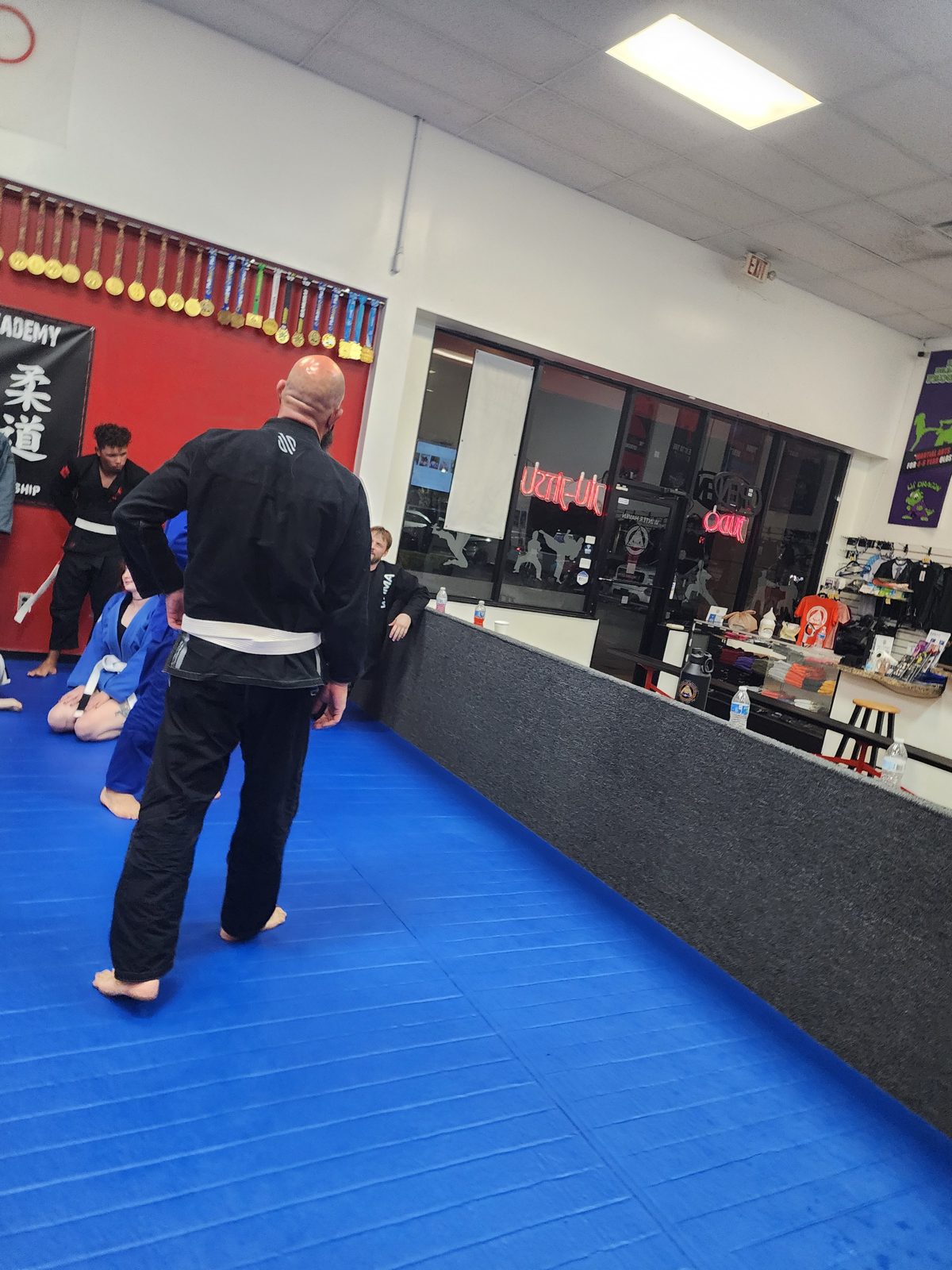 Coach demonstrating a technique during class at Winter Haven Jiu-Jitsu